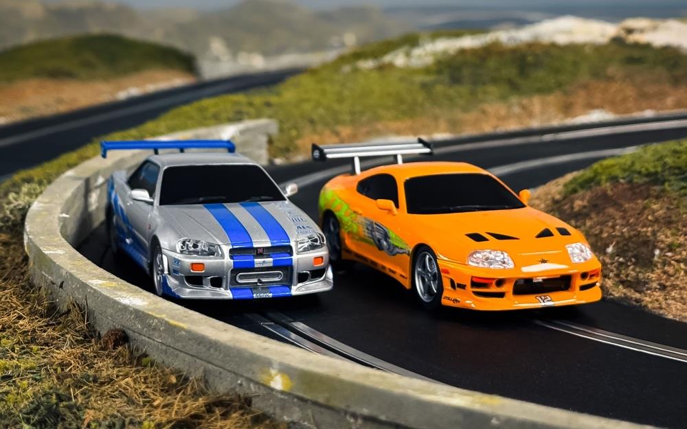 Scalextric  1:32nd Scale Fast and Furious Set 25 Years Supra vs R34